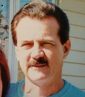Mark A.  Lampman